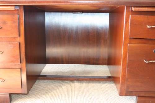 An awesome "curved front" office/ executive desk with ample drawers in great condition