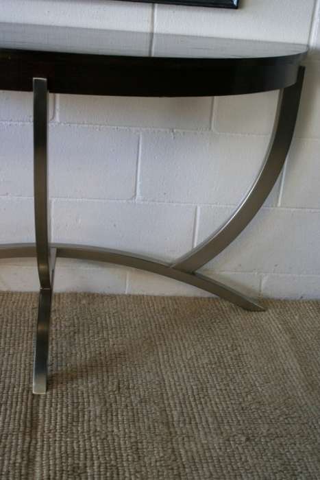An awesome modern brushed steel framed half-moon console/ occasional table with a dark hardwood top