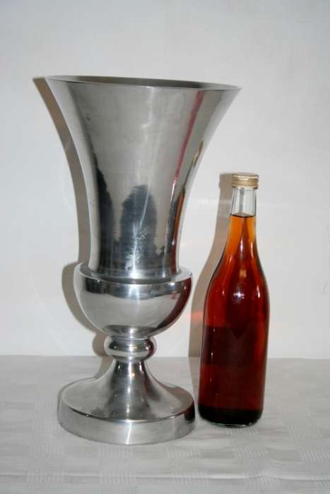 A stylish large pewter stemmed display urn-vase with a fluted flared lip and wide base