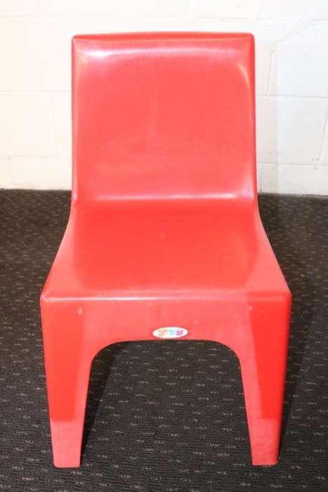 A set of 7x kids multi-coloured plastic chairs & a blue kids table; perfect for kids play room