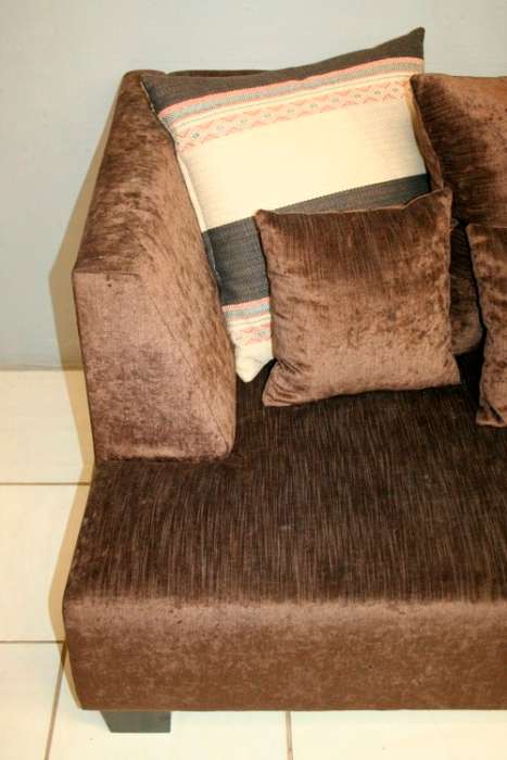 A superb modern (X-large) chocolate brown fabric couch w/ stunning cushions in exquisite condition