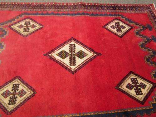 A magnificent vintage Iranian "Sirjani" Bokhtiari Kilim Persian carpet in vibrant red, blues, cream