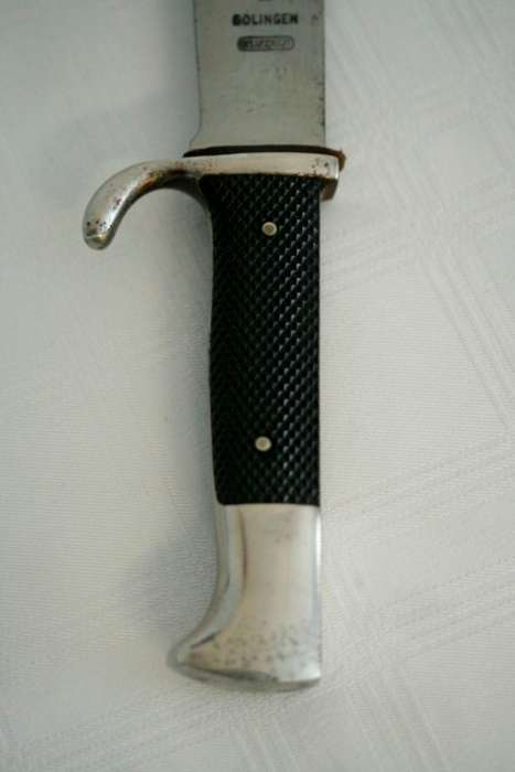 An extremely rare WWII German (early issue) "Hitler Youth" Blut und Ehre knife and scabbard