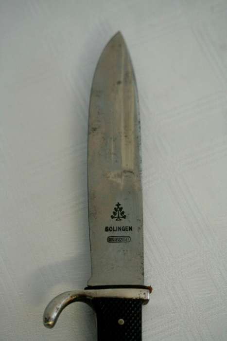 An extremely rare WWII German (early issue) "Hitler Youth" Blut und Ehre knife and scabbard