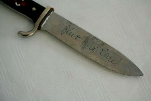An extremely rare WWII German (early issue) "Hitler Youth" Blut und Ehre knife and scabbard