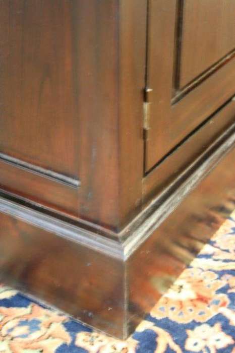 A wonderful tall teak display cabinet/ bookcase with shelves, storage cupboards and drawers