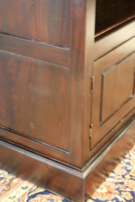 A wonderful tall teak display cabinet/ bookcase with shelves, storage cupboards and drawers