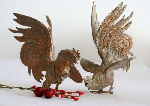A stunning pair of rare dramatic vintage Italian made brass fighting roosters in great condition
