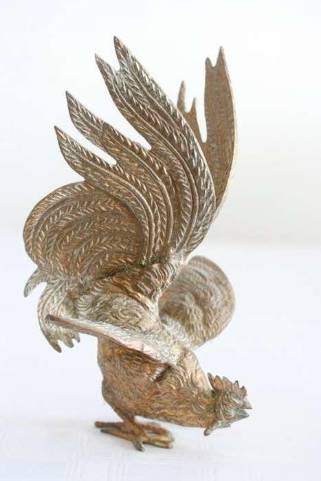 A stunning pair of rare dramatic vintage Italian made brass fighting roosters in great condition