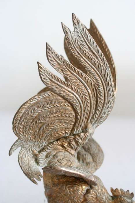 A stunning pair of rare dramatic vintage Italian made brass fighting roosters in great condition