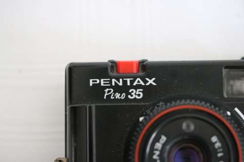 A Pentax Pino 35 fixed focus film camera in a bag in good condition - wonderful camera!