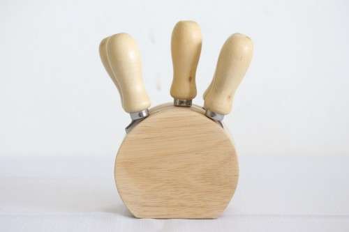 A wonderful stainless steel cheese knives and fork set in a wooden holder - an amazing gift!