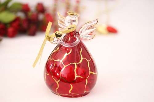 **RS17** A made hand-blown Italian red-glass angel finished with gold detailing by Flamigni