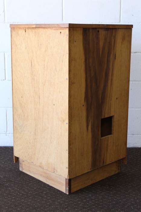 A lovely Oak single-door corner cabinet with shelves on the inside. Perfect for smaller spaces!!