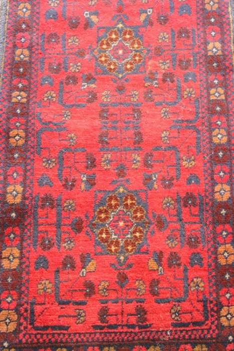An incredible and beautifully made (154cm x 54cm) Pakistani Bokhara carpet in beautiful condition
