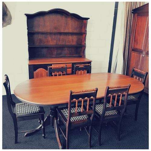 A superb Yellowwood and Imbuia dining room suite including table, 6x chairs & buffet server cabinet!