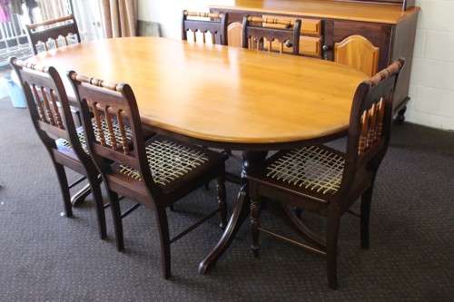 A superb Yellowwood and Imbuia dining room suite including table, 6x chairs & buffet server cabinet!