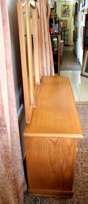 An exquisite, large Oak three drawer side-folding mirror dressing table with two cupboards and stool