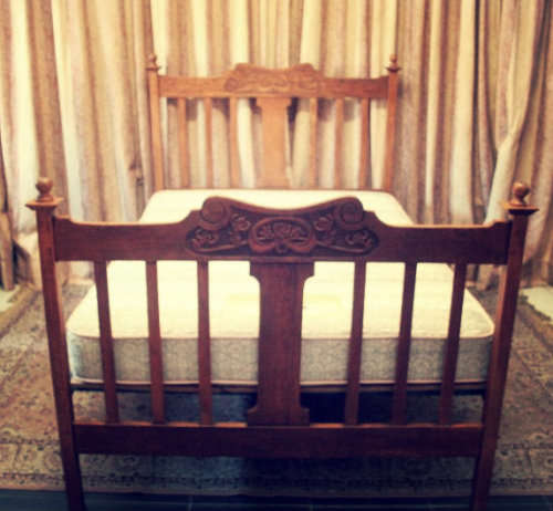A stunning vintage solid carved Oak double bed headboard & footboard with an Edblo mattress set.