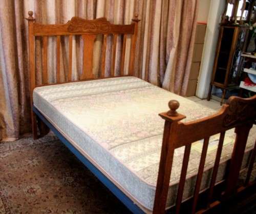 A stunning vintage solid carved Oak double bed headboard & footboard with an Edblo mattress set.