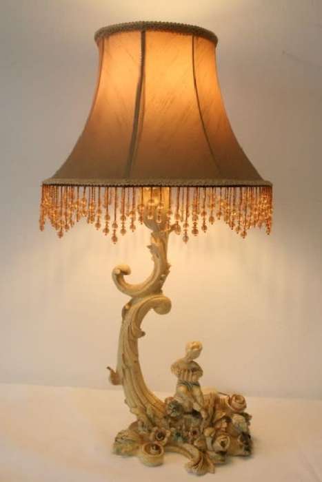 A gorgeous ornate alabastrine oxylite table lamp with stunning detailing and a stylish shade.