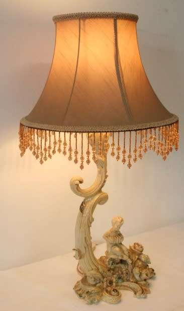 A gorgeous ornate alabastrine oxylite table lamp with stunning detailing and a stylish shade.