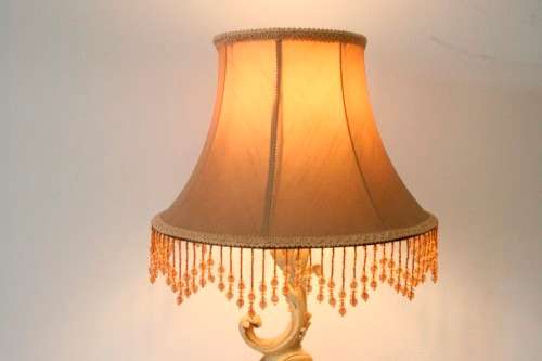 A gorgeous ornate alabastrine oxylite table lamp with stunning detailing and a stylish shade.