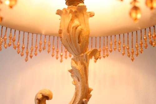 A gorgeous ornate alabastrine oxylite table lamp with stunning detailing and a stylish shade.