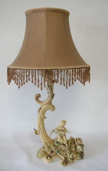 A gorgeous ornate alabastrine oxylite table lamp with stunning detailing and a stylish shade.