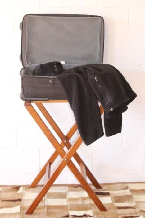 A superb & well made solid teak guest luggage stand in great condition; fold-able for easy storage