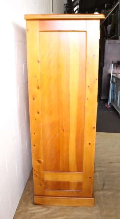 A stunning, well made double folding-door Yellow wood wardrobe with two storage drawers