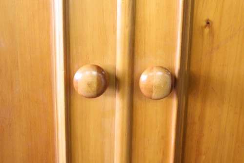 A stunning, well made double folding-door Yellow wood wardrobe with two storage drawers