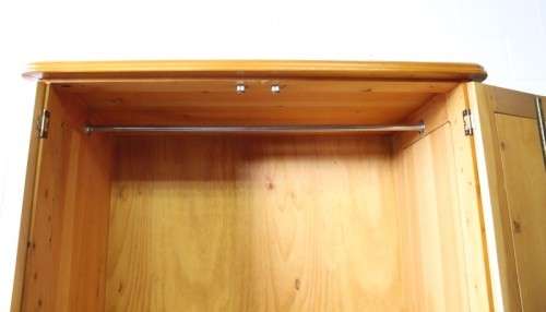A stunning, well made double folding-door Yellow wood wardrobe with two storage drawers