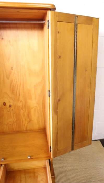 A stunning, well made double folding-door Yellow wood wardrobe with two storage drawers