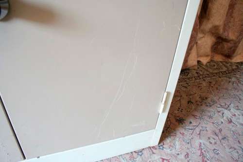 A sturdy metal multi purpose cabinet with a large cupboard, needs some tlc, perfect to paint!