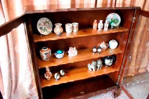 A beautifully made vintage solid Imbuia ball & claw two glass door showcase/ bookcase