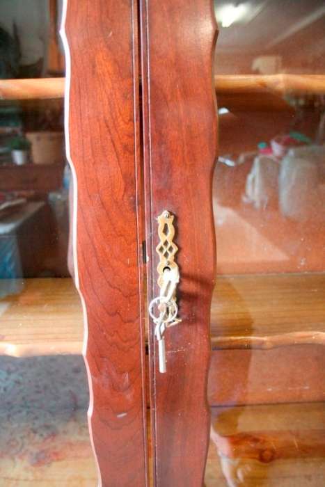 A beautifully made vintage solid Imbuia ball & claw two glass door showcase/ bookcase