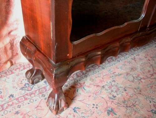 A beautifully made vintage solid Imbuia ball & claw two glass door showcase/ bookcase