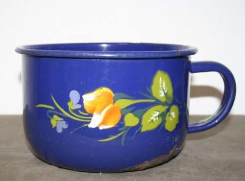 A wonderful vintage dark blue w/ hand painted flowers enamel wash basin, pitcher & chamber pot set.