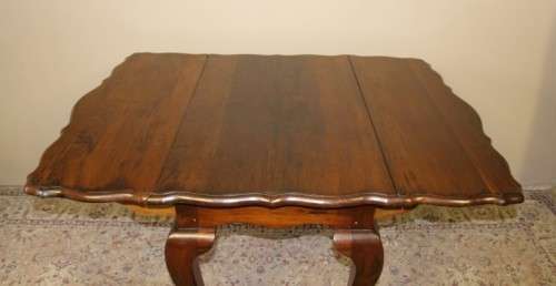 A fabulous stylish vintage drop leaf occasional table with oversized ball and claw feet. Stunning!!!