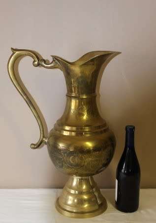 A beautiful large vintage solid brass pitcher/ jug with ornate hand chased detailing. Fabulous!!!!