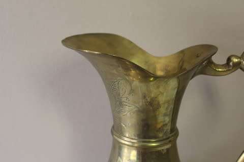 A beautiful large vintage solid brass pitcher/ jug with ornate hand chased detailing. Fabulous!!!!