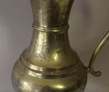 A beautiful large vintage solid brass pitcher/ jug with ornate hand chased detailing. Fabulous!!!!