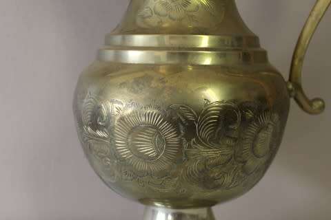 A beautiful large vintage solid brass pitcher/ jug with ornate hand chased detailing. Fabulous!!!!