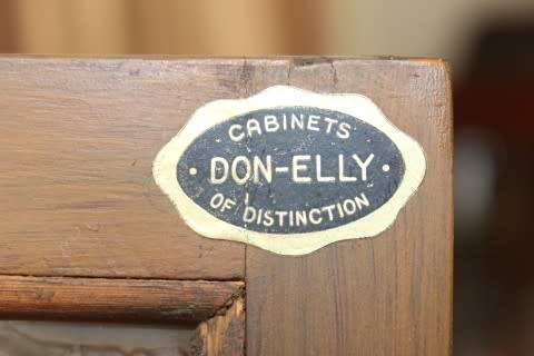 An exquisite vintage Imbuia ball & claw "Don Elly" drinks cabinet w glass doors & drawers. Fabulous!