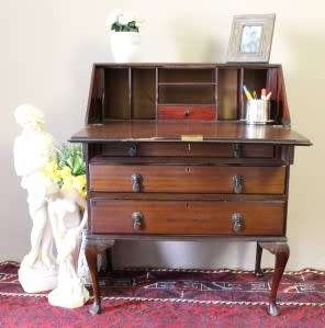 An elegant vintage fall-top writing bureau with pigeon holes and three spacious drawers. Beautiful!!