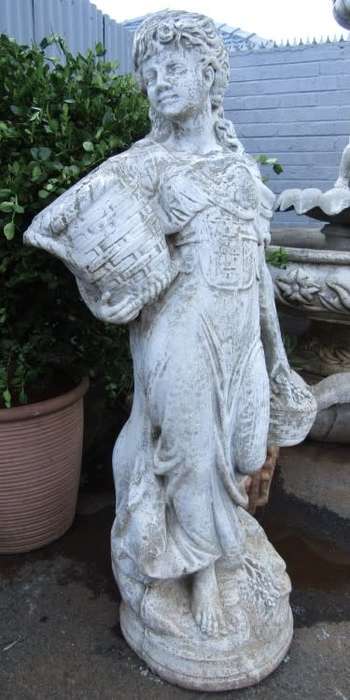 A beautiful concrete free standing water feature statue of a lady. Stunning in a fountain or garden!