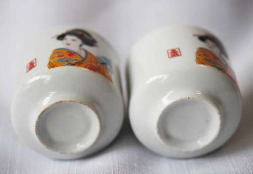 An awesome pair of ceramic rice wine cups, with an image of a woman on them. Lifespace Sale