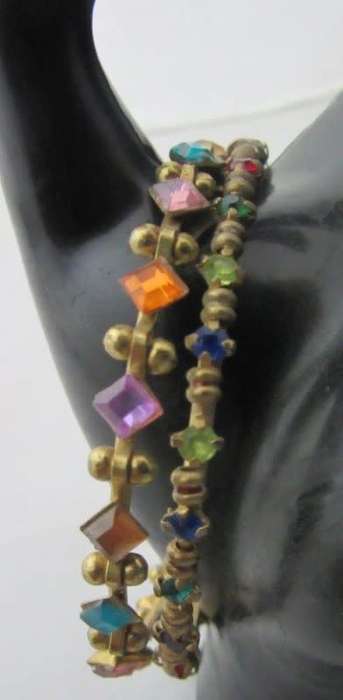 A pretty colorful pair of Indian kids bangles.
