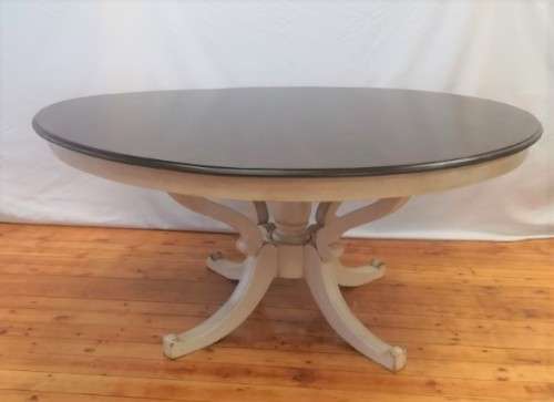 A stunning large dark wood and white base round dining table (167cm x 76cm). Xmas sale